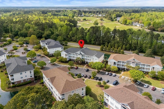 bird's eye view featuring golf course view and a residential view
