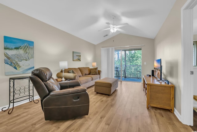 living room featuring ceiling fan, vaulted ceiling, light wood finished floors, and visible vents