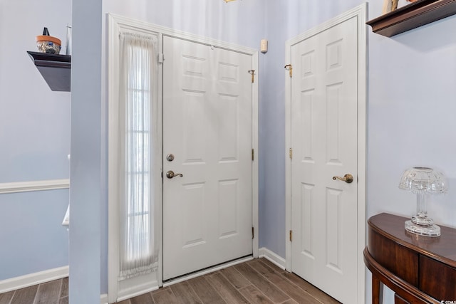 1752 Starbridge Dr, Surfside Beach, SC 29575 - entrance foyer featuring dark wood-type flooring and baseboards