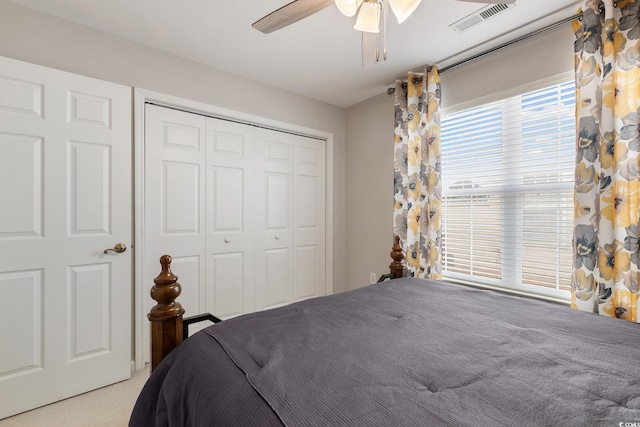 1752 Starbridge Dr, Surfside Beach, SC 29575 - carpeted bedroom with visible vents, a ceiling fan, and a closet