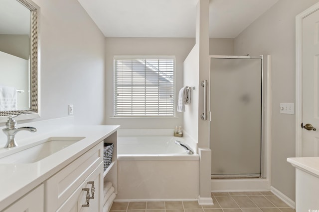 1752 Starbridge Dr, Surfside Beach, SC 29575 - bathroom with vanity, a garden tub, and a stall shower