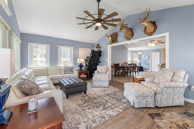 1752 Starbridge Dr, Surfside Beach, SC 29575 - living room featuring a wealth of natural light, high vaulted ceiling, wood finished floors, and ceiling fan