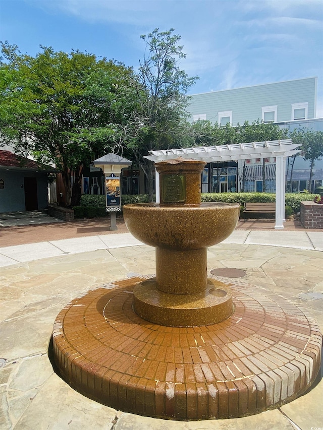surrounding community with a pergola