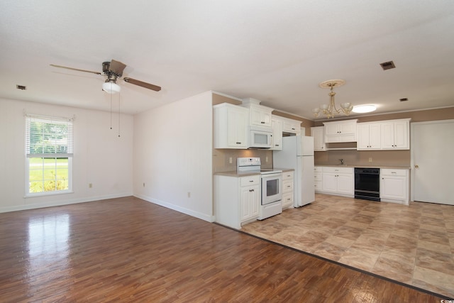 391 Waterford Dr, Georgetown, SC 29440 - kitchen with white appliances, a chandelier, light wood-type flooring, baseboards, and ceiling fan