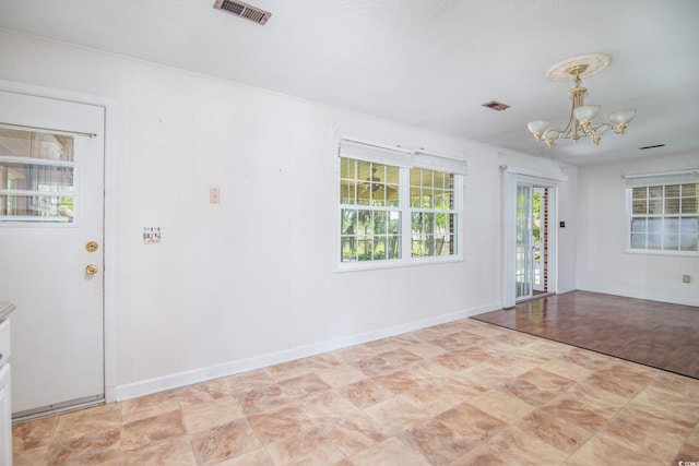 391 Waterford Dr, Georgetown, SC 29440 - foyer featuring a chandelier and baseboards