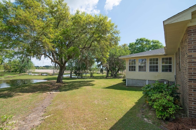 391 Waterford Dr, Georgetown, SC 29440 - view of green lawn featuring a water view