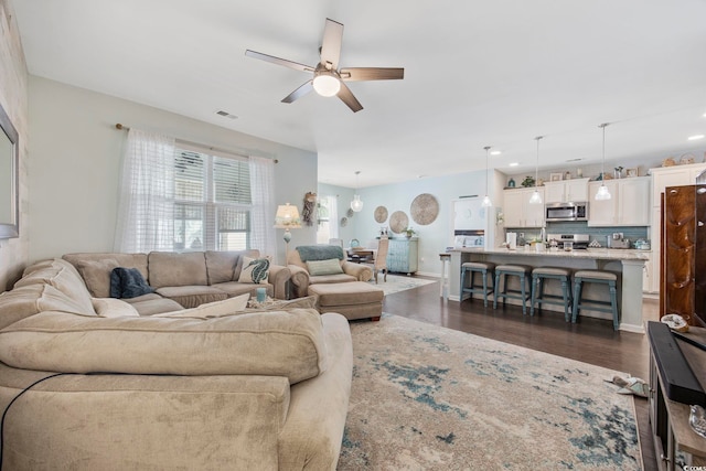 181 Ocean Commons Dr, Surfside Beach, SC 29575 - living area with dark wood-type flooring, a ceiling fan, visible vents, and recessed lighting