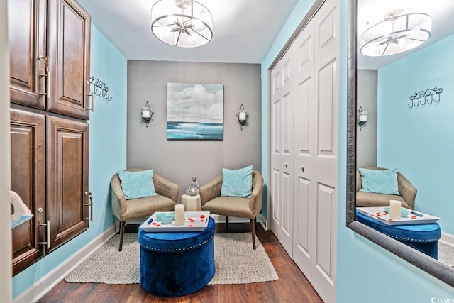 3000 N Ocean Blvd Unit 729, Myrtle Beach, SC 29577 - sitting room with dark wood-style floors and baseboards