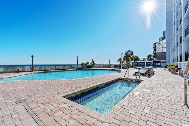 3000 N Ocean Blvd Unit 729, Myrtle Beach, SC 29577 - community pool featuring a patio