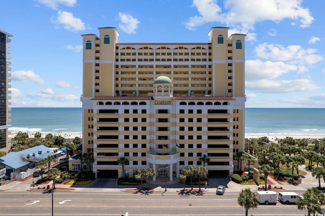 view of building exterior with a water view