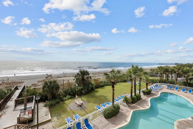 2000 Ocean Blvd N Unit 216, Myrtle Beach, SC 29588 - community pool with view of water and beach, a patio, and fence