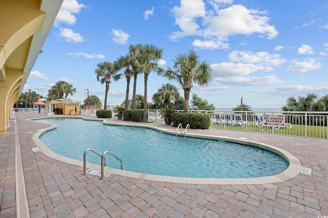 2000 Ocean Blvd N Unit 216, Myrtle Beach, SC 29588 - community pool featuring fence and a patio area
