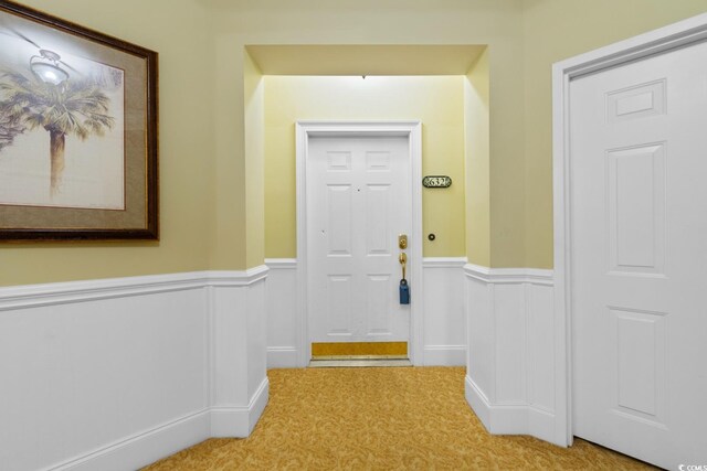 2180 Waterview Dr Unit 632, North Myrtle Beach, SC 29582 - doorway with wainscoting and carpet floors
