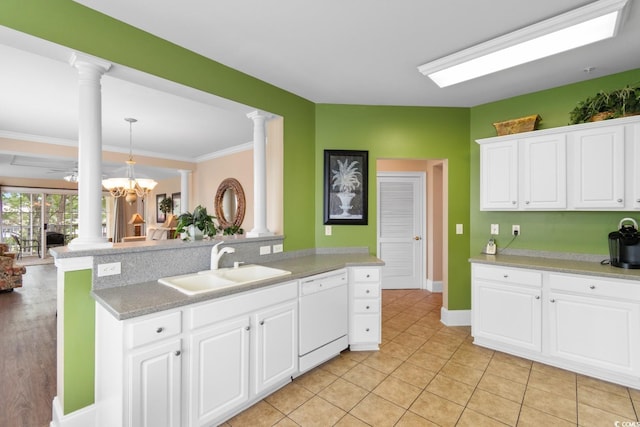 2180 Waterview Dr Unit 632, North Myrtle Beach, SC 29582 - kitchen with a sink, light countertops, decorative columns, and white dishwasher