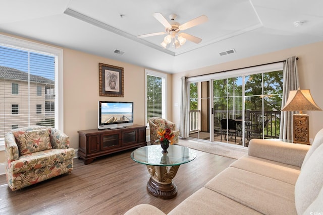 2180 Waterview Dr Unit 632, North Myrtle Beach, SC 29582 - living area with a tray ceiling, ceiling fan, wood finished floors, and visible vents