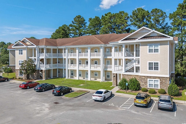 117 S Shore Blvd Unit 301, Longs, SC 29568 - view of building exterior with uncovered parking