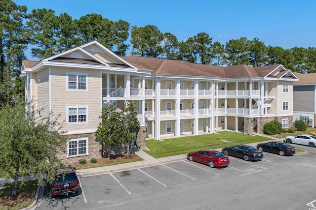 117 S Shore Blvd Unit 301, Longs, SC 29568 - view of building exterior featuring uncovered parking