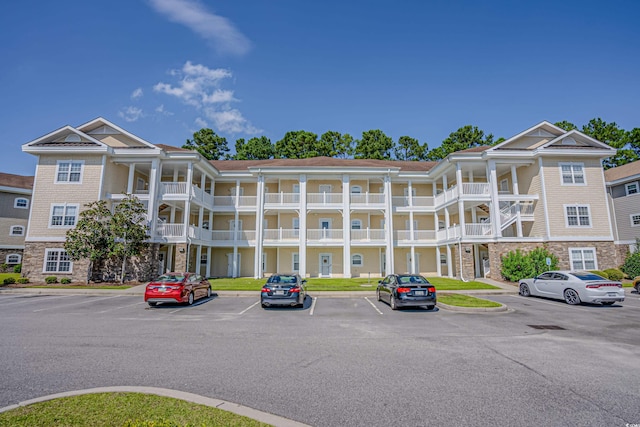 117 S Shore Blvd Unit 301, Longs, SC 29568 - view of building exterior with uncovered parking