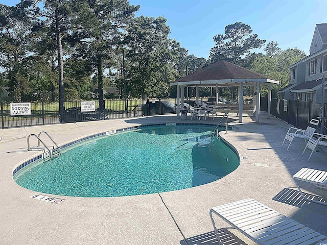 500 Fairway Village Dr Unit 3I, Myrtle Beach, SC 29588 - community pool with a gazebo and a patio area