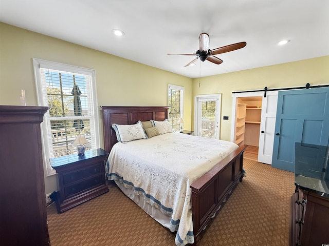147 Brown Pelican Loop, Pawleys Island, SC 29585 - carpeted bedroom with recessed lighting, a barn door, and ceiling fan
