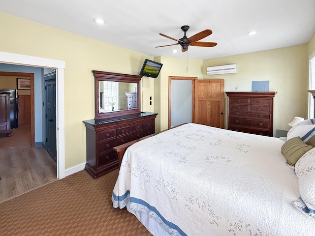 147 Brown Pelican Loop, Pawleys Island, SC 29585 - bedroom with a wall mounted AC, carpet floors, recessed lighting, and a ceiling fan
