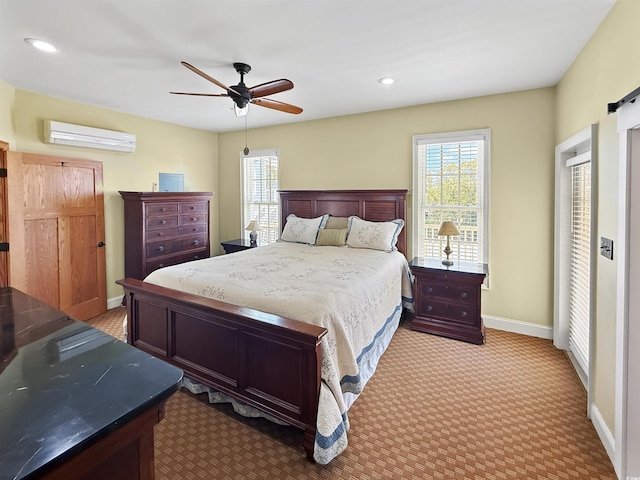 147 Brown Pelican Loop, Pawleys Island, SC 29585 - carpeted bedroom with a wall mounted air conditioner, multiple windows, ceiling fan, and recessed lighting