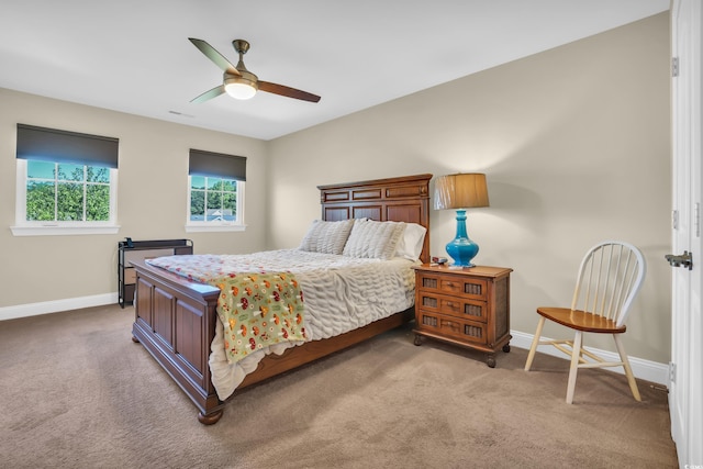 bedroom featuring carpet floors, baseboards, and ceiling fan