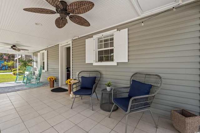 view of patio featuring a ceiling fan