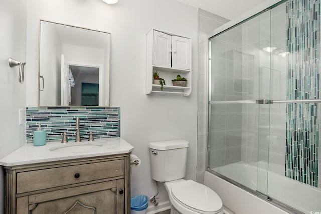 6001-5417 S Kings Hwy, Myrtle Beach, SC 29575 - bathroom with toilet, vanity, bath / shower combo with glass door, and tasteful backsplash