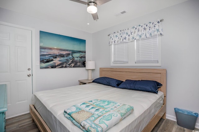 6001-5417 S Kings Hwy, Myrtle Beach, SC 29575 - bedroom featuring wood finished floors, baseboards, and a ceiling fan