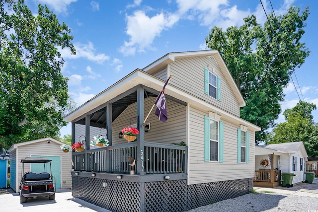 6001-5417 S Kings Hwy, Myrtle Beach, SC 29575 - view of front of house with covered porch and an outbuilding