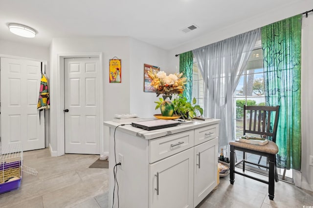3564 Evergreen Way Unit 3564, Myrtle Beach, SC 29577 - kitchen with light countertops, white cabinetry, and light tile patterned floors