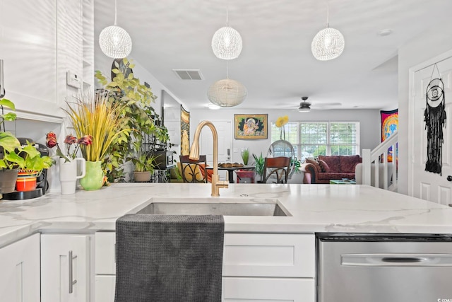 3564 Evergreen Way Unit 3564, Myrtle Beach, SC 29577 - kitchen featuring dishwasher, white cabinets, ceiling fan, a sink, and light stone counters
