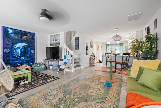 3564 Evergreen Way Unit 3564, Myrtle Beach, SC 29577 - living room featuring stairs, finished concrete floors, and a ceiling fan