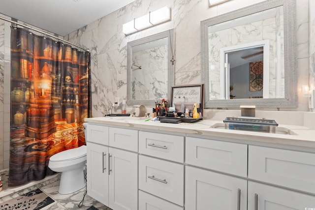 3564 Evergreen Way Unit 3564, Myrtle Beach, SC 29577 - bathroom featuring marble look tiles, toilet, double vanity, tile walls, and a shower with curtain