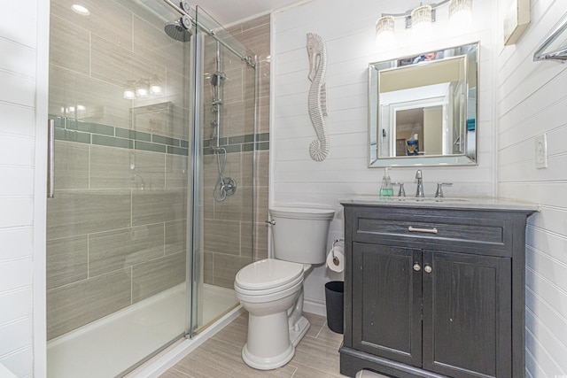 4560 Greenbriar Dr Unit 306B, Little River, SC 29566 - full bath with toilet, a shower stall, vanity, and wood finished floors