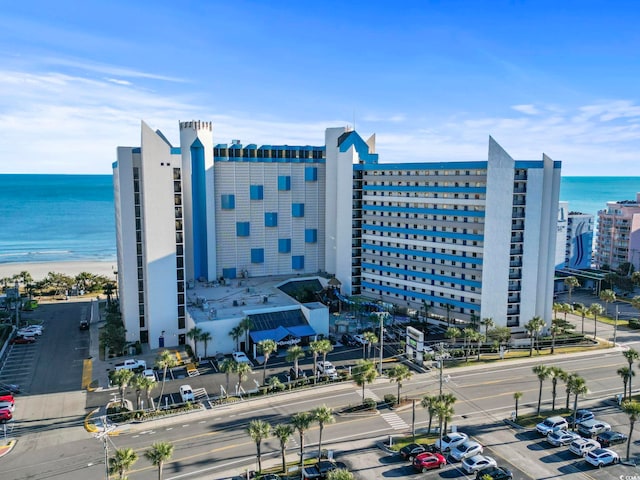 7100 N Ocean Blvd Unit 612, Myrtle Beach, SC 29572 - view of property with uncovered parking and a water view
