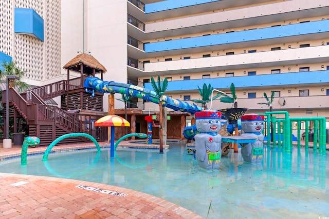7100 N Ocean Blvd Unit 612, Myrtle Beach, SC 29572 - view of swimming pool featuring a water play area and stairway