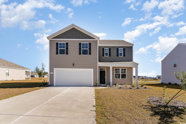 2836 Riverboat Way, Conway, SC 29526 - view of front facade featuring driveway, an attached garage, and a front lawn