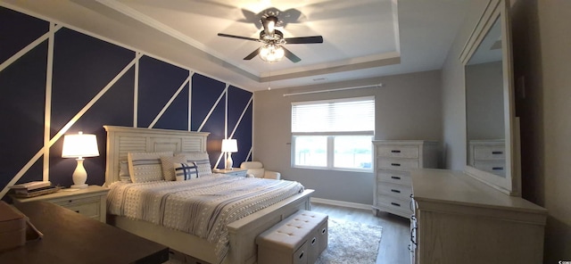 897 Wild Leaf Loop, Conway, SC 29526 - bedroom with a tray ceiling, wood finished floors, and ceiling fan