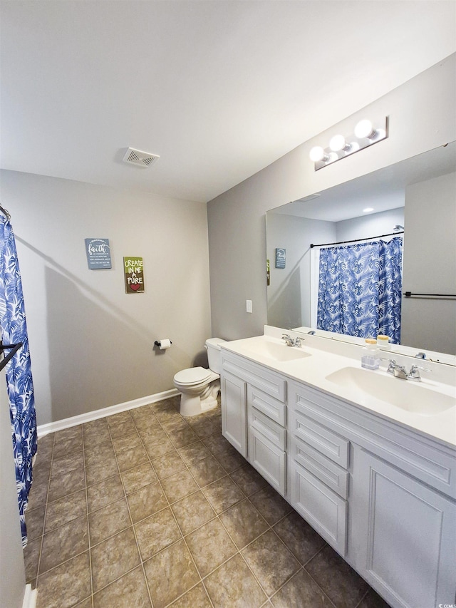 897 Wild Leaf Loop, Conway, SC 29526 - bathroom featuring double vanity, toilet, and tile patterned flooring