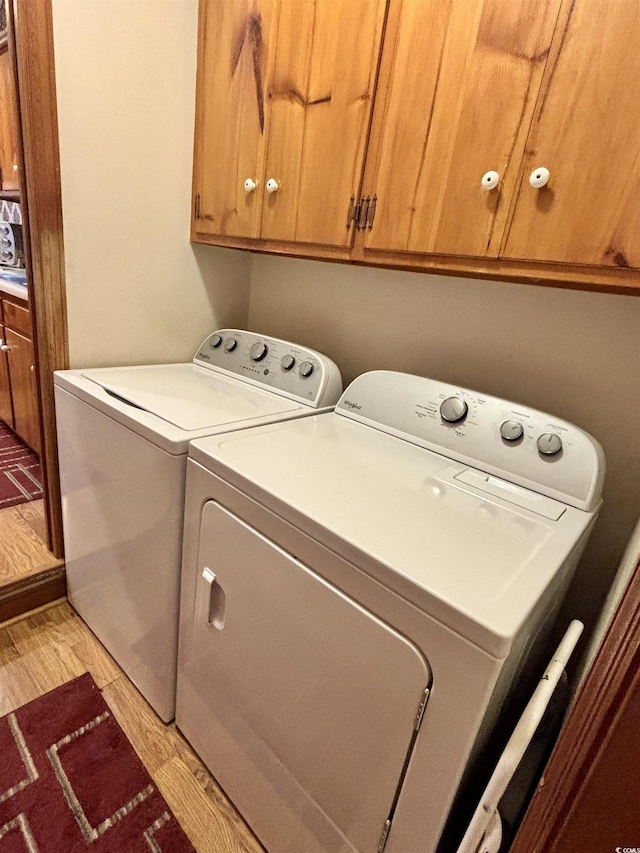 116 Green Lake Dr, Myrtle Beach, SC 29572 - laundry room featuring washer and dryer and cabinet space