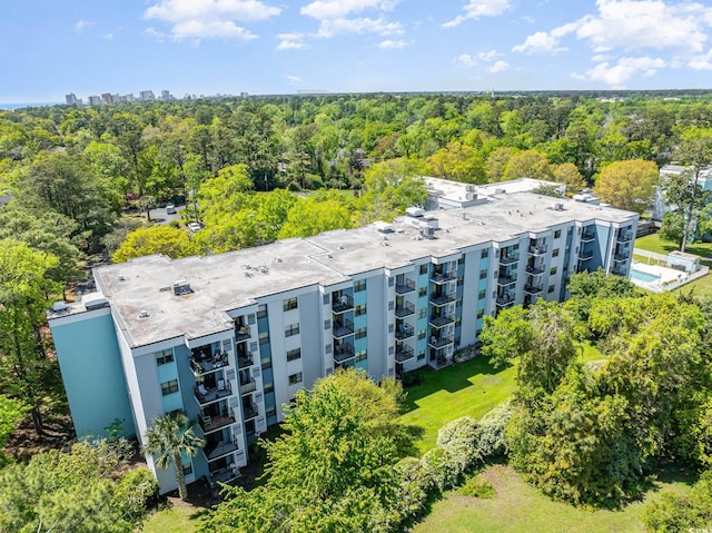 5001 Little River Rd Unit 501E, Myrtle Beach, SC 29577 - bird's eye view of apartment complex and a forest