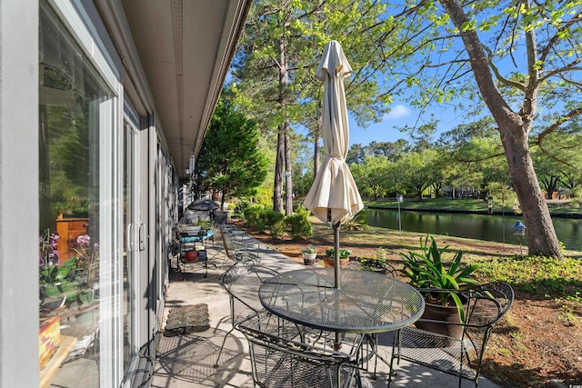 111 Cedar Ridge Ln, Conway, SC 29526 - view of patio featuring a water view and outdoor dining space