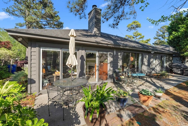 111 Cedar Ridge Ln, Conway, SC 29526 - back of house featuring a patio and a chimney