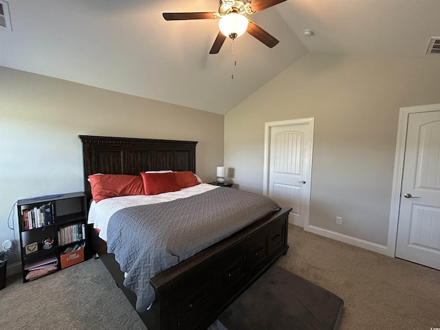 bedroom featuring carpet, vaulted ceiling, baseboards, and a ceiling fan