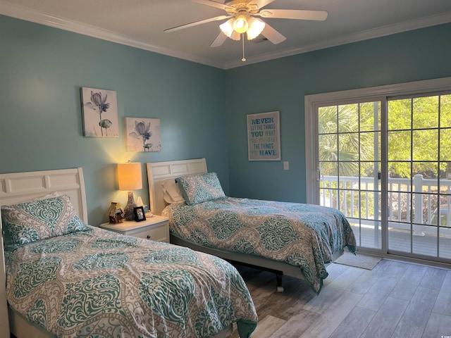 1516 Edge Dr Unit 101, North Myrtle Beach, SC 29582 - bedroom with crown molding, ceiling fan, wood finished floors, and access to exterior