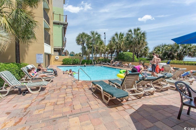 1200 N Ocean Blvd N Unit 905, Myrtle Beach, SC 29577 - community pool with a patio