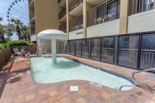 1200 N Ocean Blvd N Unit 905, Myrtle Beach, SC 29577 - community pool with a patio area