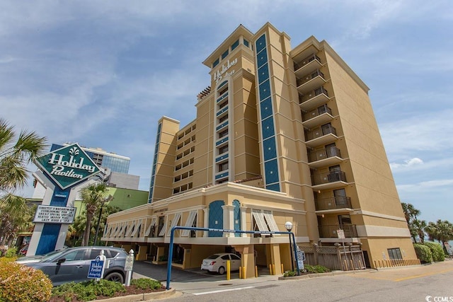1200 N Ocean Blvd N Unit 905, Myrtle Beach, SC 29577 - view of property featuring covered parking